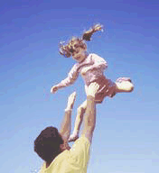 Roberto with baby having fun with flying lessons.